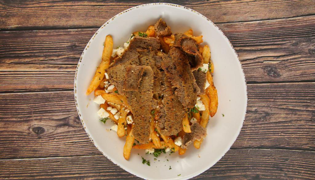 Gyros Fries Bowl · Lamb and Beef Gyros on top Delicious Fries with Choice of Greek Fries or Philly Style Fries!

Greek fries: Includes Feta Cheese and Special Greek Dressing
Philly Fries: Includes Grilled onions, mushrooms, bell peppers, and provolone cheese!