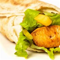 Chicken Grill (Tawook) · Char-grilled chicken cubes tawook with lettuce, pickles, fries, and garlic or mayo sauce.