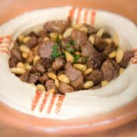 A2 Hummus & Beef · Hummus topped with diced beef tenderloin. Served with pita bread and assorted vegetables.