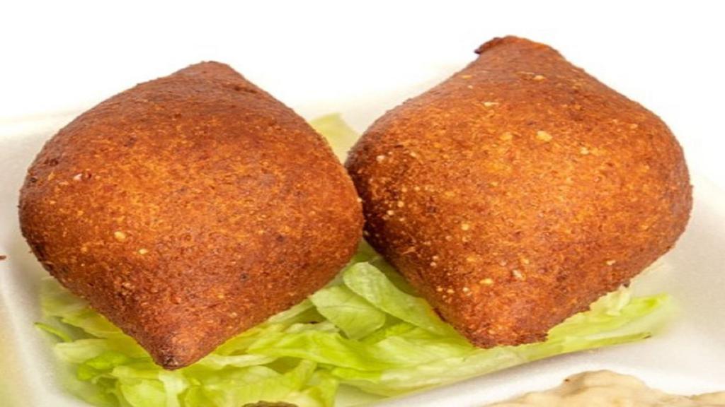 H2 Kibbeh (3Pcs) · Ground beef and bulgur wheat patty stuffed with minced beef, onions, and pine nuts.