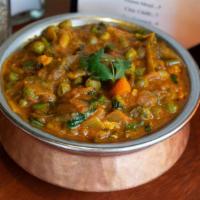 Vegetable Curry [V, Gf] · A house favorite. Mixed vegetables seasoned in medium thick curry.