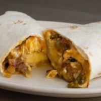 Graburrito · Eggs, cheddar, chile.. Add Bacon or Sausage for an additional charge