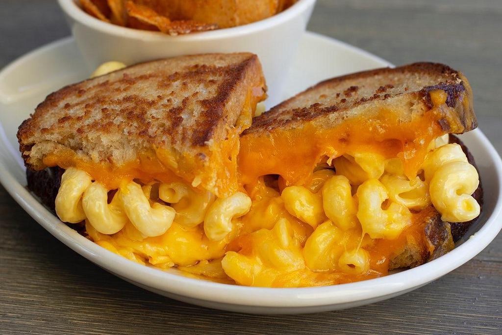 Grilled Mac & Cheese Melt · Grilled Cheese meets our Mac & Cheese for a gooey, creamy, crunchy treat. Served with your choice of side.