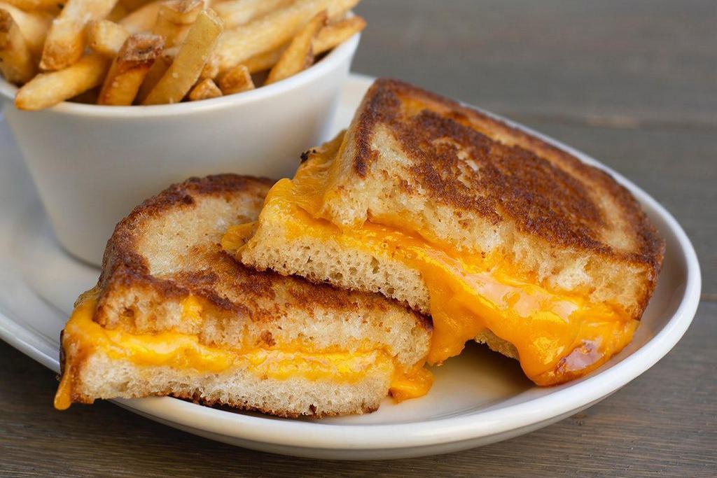 Grilled Cheese · VOTED BEST OF ABQ. Simply delicious -- our buttered Rustic white bread & thickly sliced cheddar. Served with your choice of side.