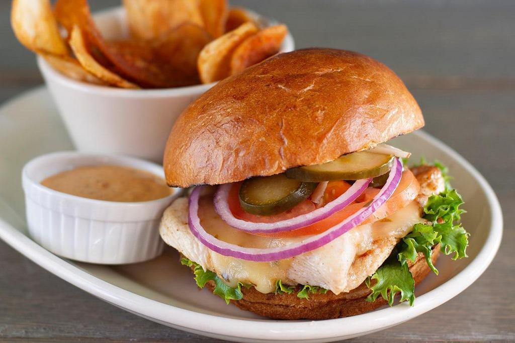 Grilled Or Crispy Chicken Sandwich · All natural, cage free chicken breast & homemade pickles, lettuce, tomato & onion on our bakery bun. Served with our spicy STAR sauce. Your choice of crispy, hand breaded or grilled and lightly seasoned.