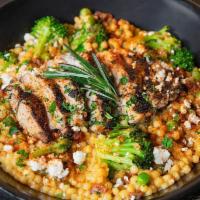 Chicken Couscous Risotto · Creamy pearled couscous risotto, rosemary infused chicken breast, feta, green peas, fresh br...