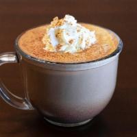 Mexican Latte · A signature latte with cinnamon and Ghirardelli® Sweet Dark Chocolate Cocoa, topped with hom...