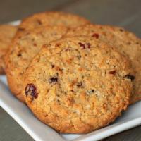 Cowgirl Cookie · Our famous Cowgirl Cookie, baked with coconut flakes, brown sugar, oats, apricots, raisins, ...