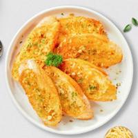 Go For Garlic Bread · (2 pieces) Toasted homemade bread baked with vegan garlic butter, and parsley.
