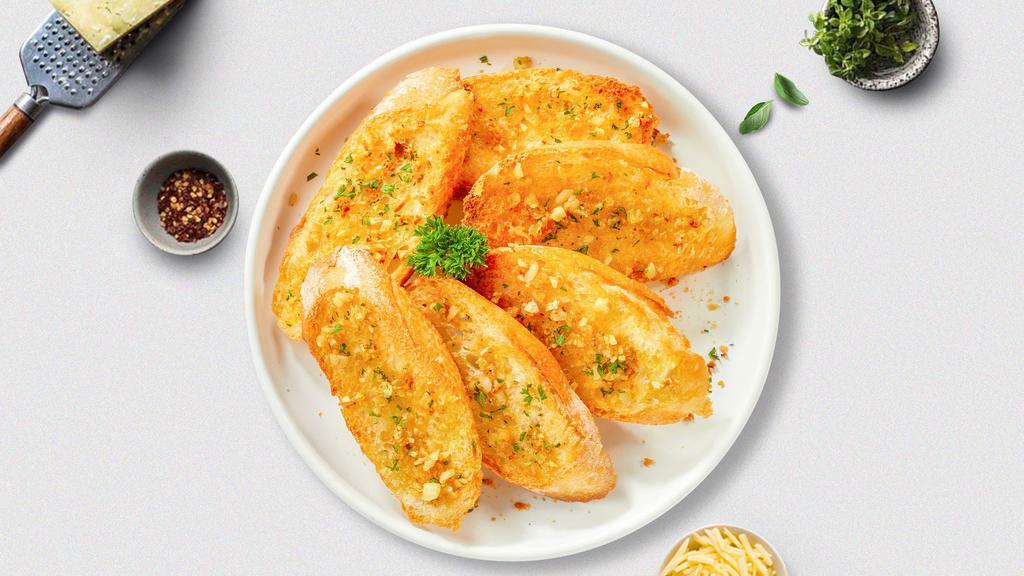 Go For Garlic Bread · (2 pieces) Toasted homemade bread baked with vegan garlic butter, and parsley.