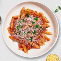 Red Ritz Pasta (Penne) · Fresh penne pasta served with a house vegan red sauce and your choice of toppings.