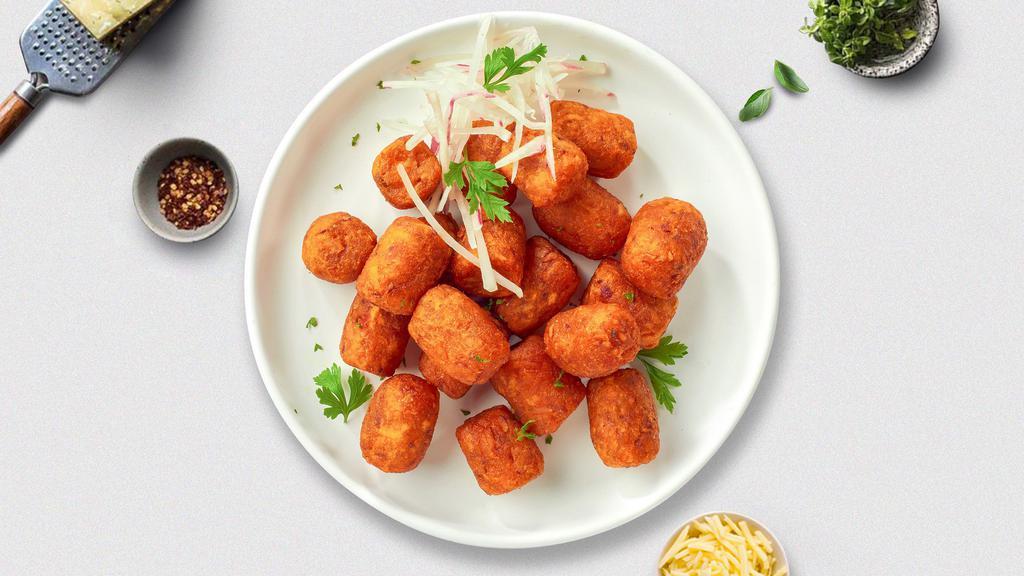 Sweet Spot Potato Tots · Shredded sweet potatoes formed into tots, battered, and fried until golden brown. Served with your choice of sauce.