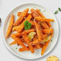 Sweet Spot French Fries · Cut sweet potato wedges fried until golden brown.