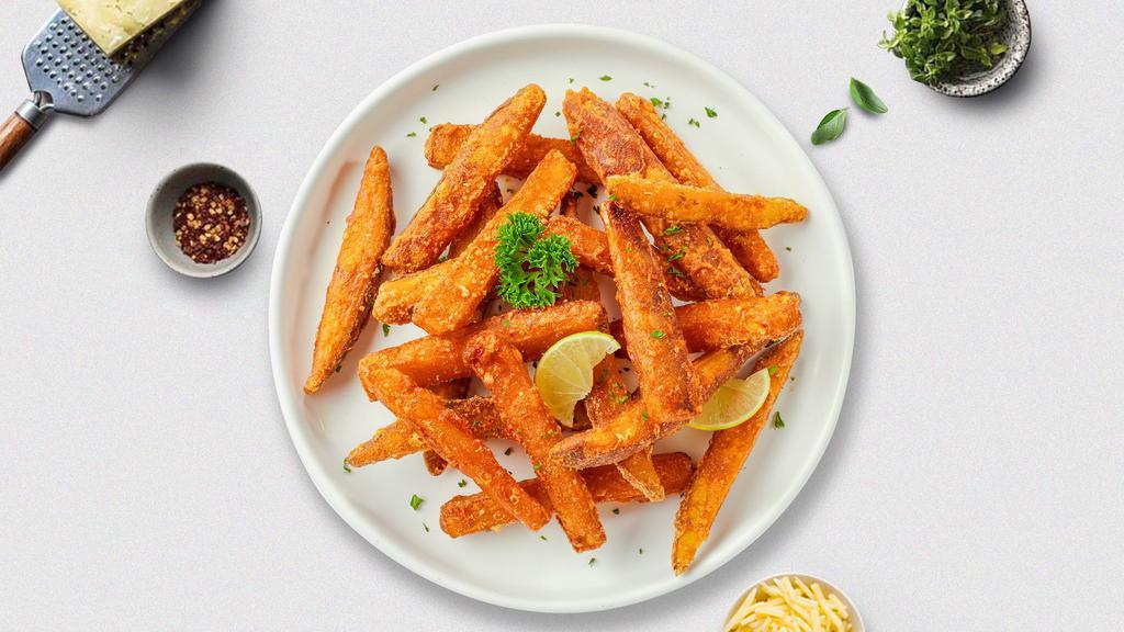 Sweet Spot French Fries · Cut sweet potato wedges fried until golden brown.