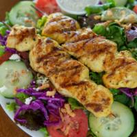 Grilled Chicken Salad · Grilled chicken breast served with Greek salad and side of house tzatziki sauce.