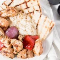 Chicken Kebab Plate · Grilled chicken breast served with rice, grilled vegetables or hummus, pita bread, side of h...