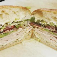 Turkey Blt · Turkey breast, applewood smoked bacon, lettuce, tomato and our special dressing.