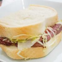 Pastrami & Swiss · Thinly sliced pastrami with Swiss cheese, lettuce, tomato, mustard and our special dressing.