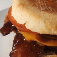 Bbq Bacon Hammy W  Tots · Bacon , Hashbrown and FYH Cheese smothered in Agave BBQ Sauce in an English Muffin Bun serve...