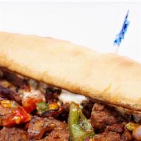 Philly Cheesesteak With Fries · Our popular steak meat grilled along with bell peppers and red onion covered in melted chees...