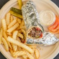 Beef Shawarma Wrap / Pita Pocket · Served with fries and tahini sauce (contains sesame).