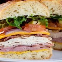Club Tasty · HH roasted all natural turkey breast, Zoe's Black Forest ham and thick sliced bacon, sharp c...