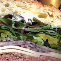 Liotta · Zoe's Black Forest ham, Genovese salami (contains gluten), provolone, red onion, green peppe...