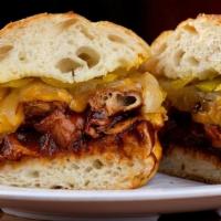 The Juke · Vegan Chicken (contains gluten), our classic BBQ sauce, sautéed onions, banana peppers, and ...