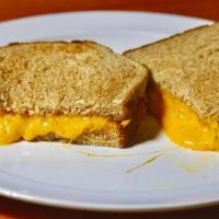 Grilled Cheese · Grilled cheddah on our whole wheat sliced bread