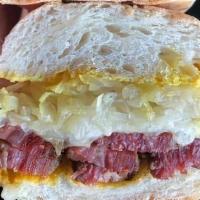 Corleone · Hand cut, house cured pastrami, swiss, sauerkraut, and yellow mustard on a demi baguette