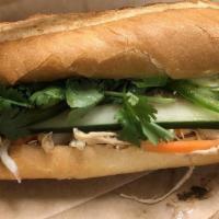 Chicken Banh Mi  · Stir fry shredded chicken, cilantro, pickled carrot & daikon, jalapeno, cucumber, house aioli.