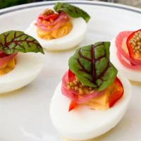 Deviled Eggs · Farm fresh eggs, pickled Fresno peppers and red onions, mustard seed, micro greens