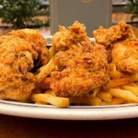 Southern Buttermilk Fried Chicken Tenders · Country chicken gravy, honey mustard & BBQ ranch dipping sauces, crispy shoestring fries & y...