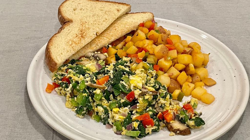 Veggie Scramble · 2 Eggs, Tomato, Bell Pepper, Spinach, Onions,
Mushrooms, Cheddar Jack Cheese,
Homestyle Potatoes