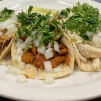 4 Tacos · Four soft hand made tortillas with your choice of meat, topped with cilantro, and onions.