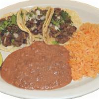 Taco Plate (3 Pieces) · Three soft hand made tortillas with your choice of meat, topped with cilantro and onions wit...