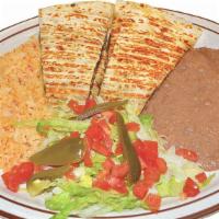 Quesadilla Plate · Flour tortilla, with your choice of meat, Monterey jack cheese. Beans, rice, lettuce, tomato...