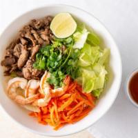 Bun Tom Thit Nuong · Noodles, salad, prawn and char-broiled pork, and sauce with assorted mixtures.