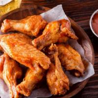Buffalo Wings With Medium Sauce · Delicious Chicken wings tossed in buffalo sauce and fried to perfection. Served with Medium ...