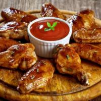 Buffalo Wings With Sweet & Sour
Sauce · Delicious Chicken wings tossed in buffalo sauce and fried to perfection. Served with Sweet &...