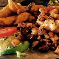 Mariscada Fria · Marinated seafood mix (Shrimp, Octopus, and Scallop). Tossed with lime juice and shaved red ...