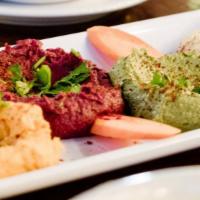 Rainbow Hummus Plate · Vegan, gluten-free. A real platter of the rainbow: samples of 4 colors of hummus choices. Ya...
