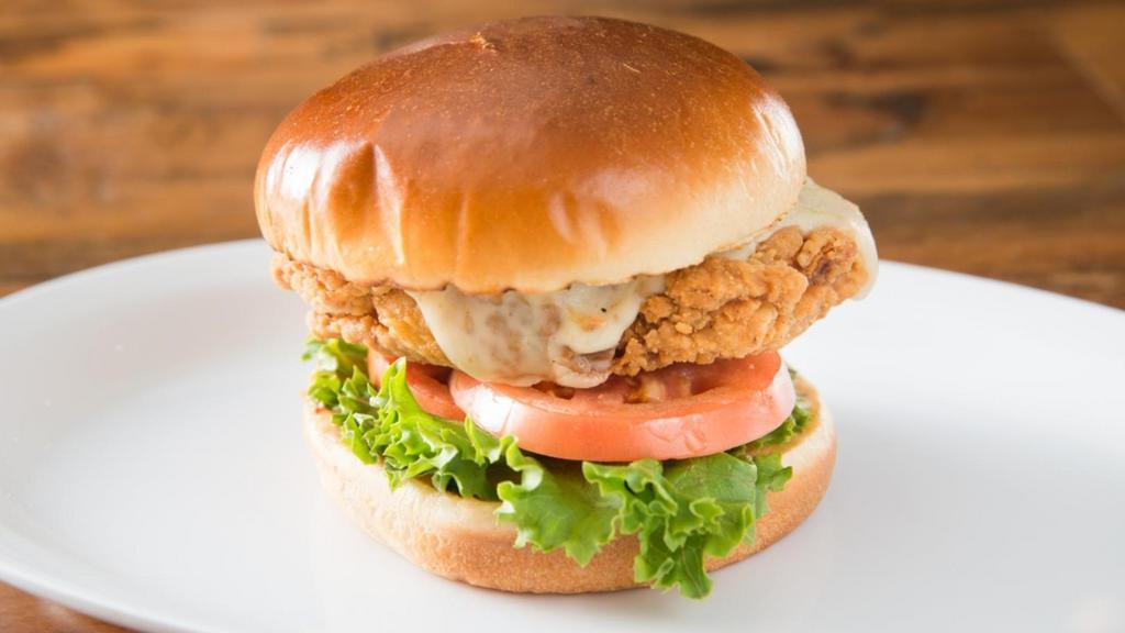 Fried Chicken · 5 oz of deep fried chicken breast, pepper jack cheese, lettuce, tomatoes, onions, pickles and house sauce on brioche bun.