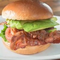 Avocado Blt · fresh avocado, 3 strips of bacon, lettuce, tomatoes and house sauce on brioche bun.