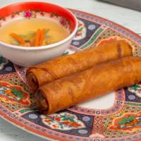 Vegetarian Egg Roll · Deep fried rolls filled with tofu, noodles, onion, carrot and taro. Served with fish sauce. ...