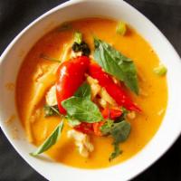 Red Curry Chicken · Spicy. Tender chicken, bamboo shoots and fresh basil leaves cooked in red curry and coconut ...