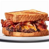 Twisted Texas Melt · Yippee Kai Yay, hungry trucker. Two 4oz Patties meets caramelized onions, bacon and cheddar ...