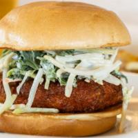 Buffalo Chicken Sandwich · All natural chicken breast, panko crusted and dipped in
sriracha buffalo sauce and topped wi...