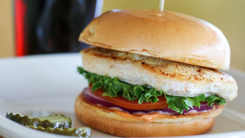 Grilled Chicken Sandwich · All natural chicken breast, antibiotic-free chicken breast, lettuce, red onion, tomato, Tru-sauce.