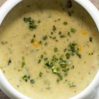 Roasted Corn Chowder With Poblano Chiles · Topped with fresh chive.